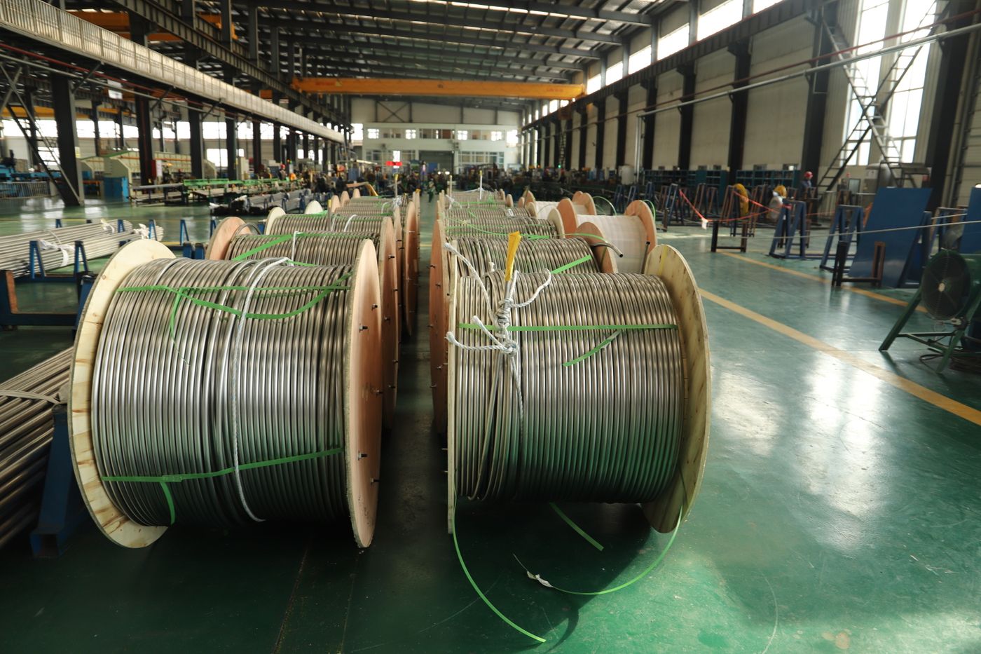 AI vision system detecting steel wire reels in a manufacturing warehouse